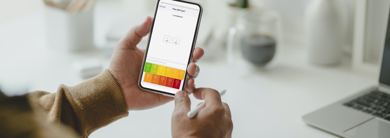 Person rating pain levels through the Ascenti Physio app